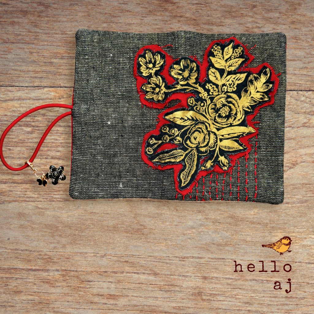 navy tweed journal cover open view showing gold floral raw edge applique and red trim – hello.aj