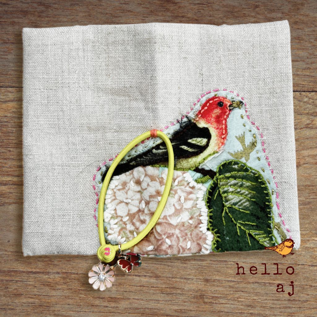 handmade linen journal cover with elastic closure and yellow bead detail – hello.aj