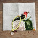 handmade linen journal cover with elastic closure and yellow bead detail – hello.aj